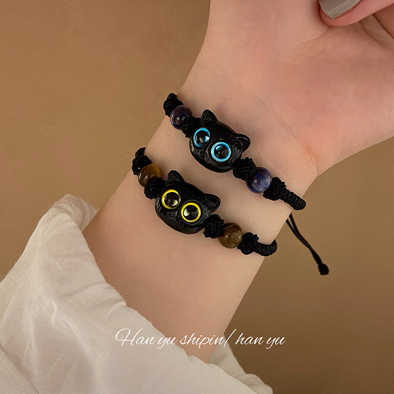 Brazalete de extracción de extracción de la mano del gato negro del gato negro